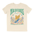 Natural youth t-shirt with 'MEOW SKATEBOARDS' graphic featuring a cat on a skateboard and rolling through meadow of flowers.
