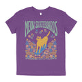 Purple youth t-shirt with 'MEOW SKATEBOARDS' graphic featuring a cat on a skateboard and rolling through meadow of flowers.