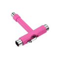 Pink T-shaped skate tool with metal ends on a white background