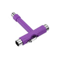 Purple T-shaped skate tool with silver ends on a white background