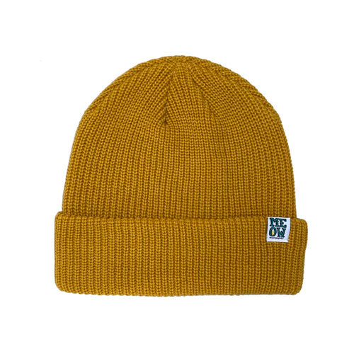 Yellow knit beanie with a logo tag on a white background